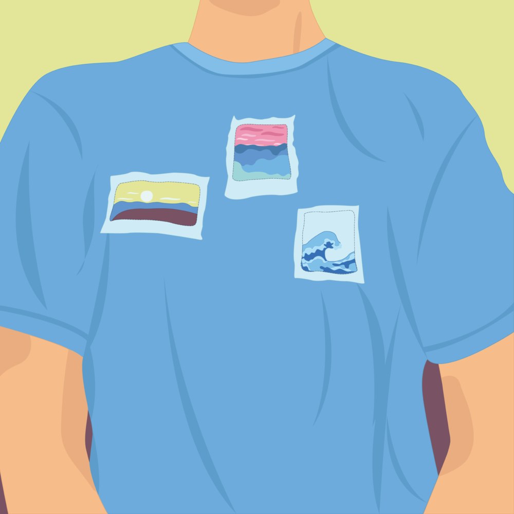 Close-up of a person wearing a t-shirt with images of the ocean on it