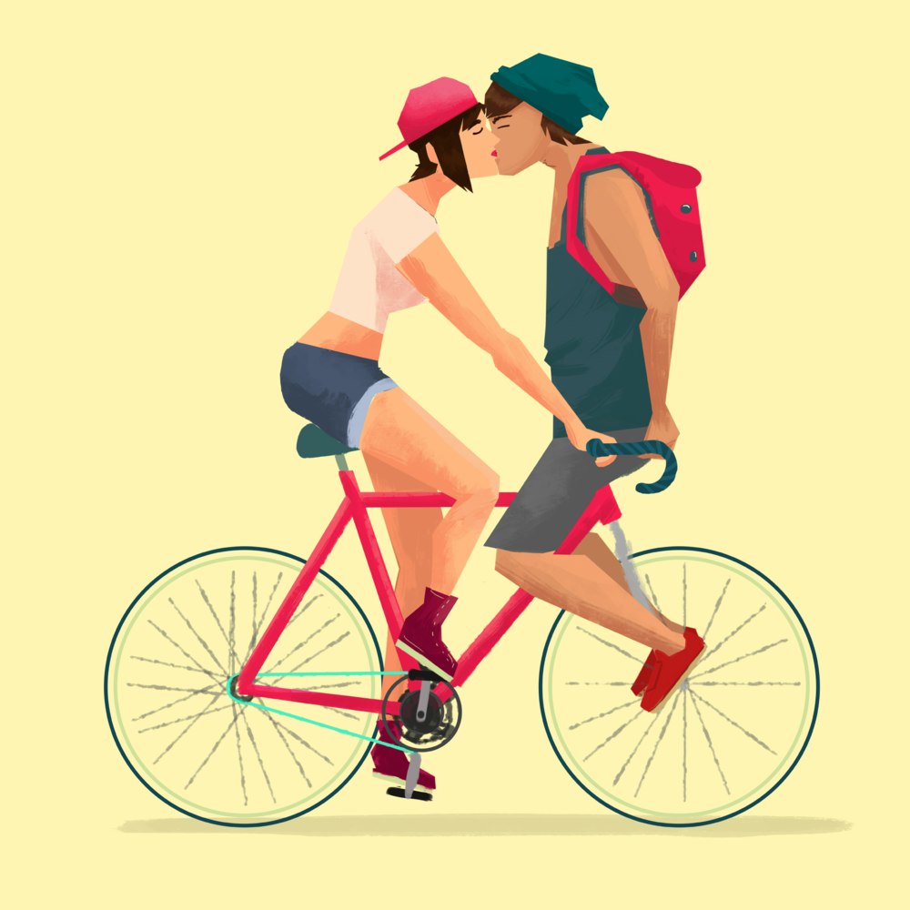 Couple kissing on a bicycle