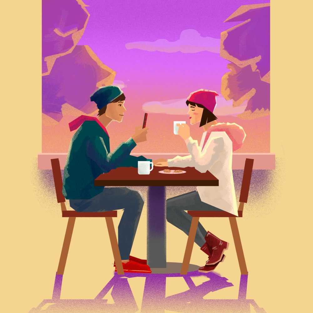 Couple taking a photo on a mobile phone while sharing food and drinks at an outdoor cafe