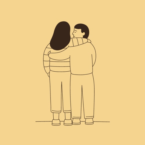 Couple walking arm in arm