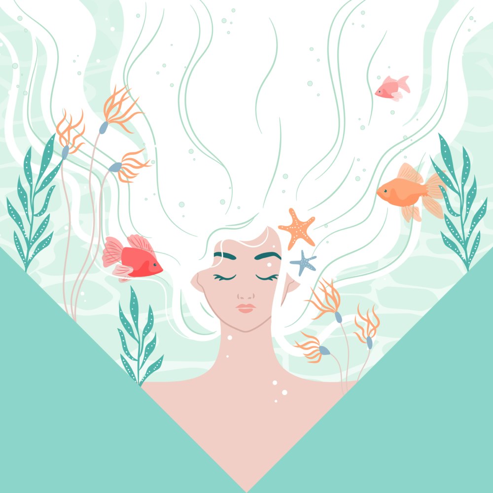 Dreamy woman with fish and seaweed floating through her hair