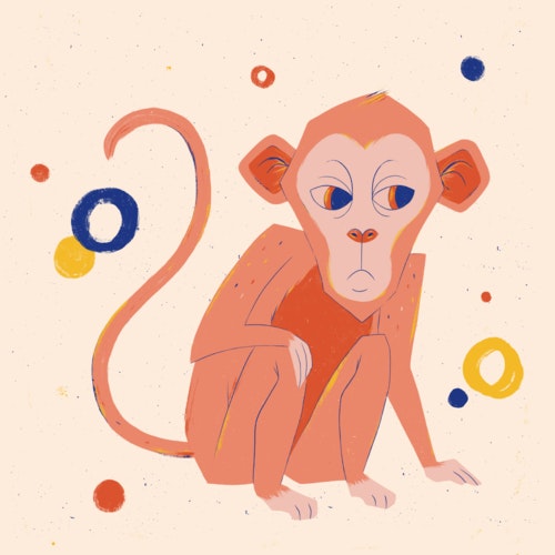 Festive, crouching monkey