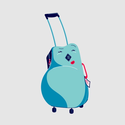 Small suitcase on wheels with a smiling face