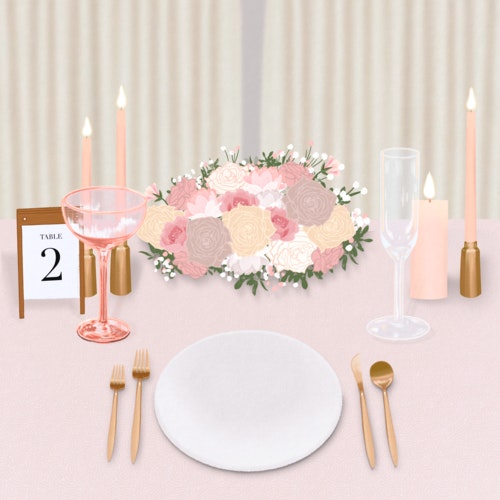 Table decorated for a wedding with champagne glasses, candles and flowers.