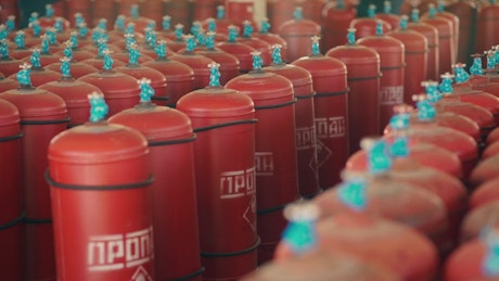 A bulk collection of fire extinguishers.