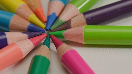 A close up shot of a multicolored wood pencils creating a circle.