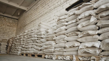 A large warehouse stored with wheat ready for shipment.