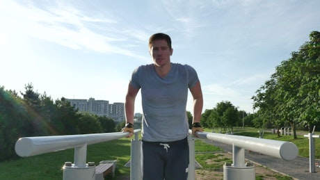 A man doing exercise in the park