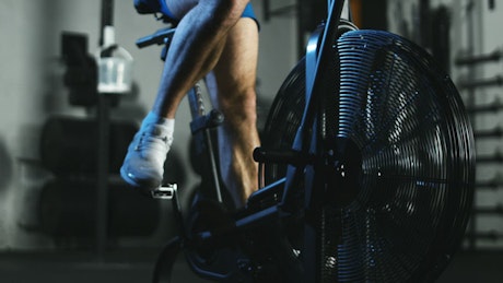 A man training in an air bike