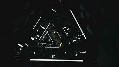 Abstract tunnel of dark triangular lights.
