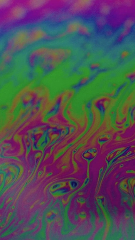Abstract video of shapes and colors of a soap bubble.
