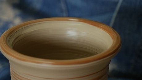 Adding color to a clay vase