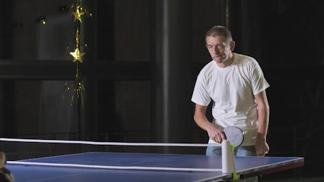 Adult man playing Table Tennis
