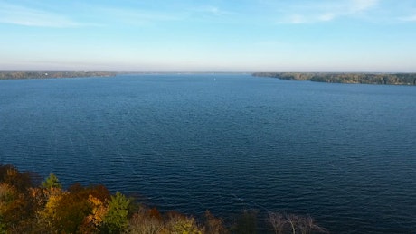 Aerial flight over a lake.