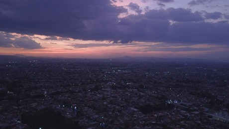 Aerial landscape of a huge city at dusk.
