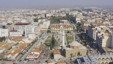 Aerial panorama of a big city with a mosque.
