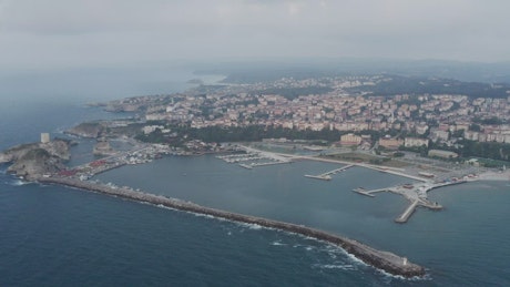 Aerial panorama of a city on a coast.