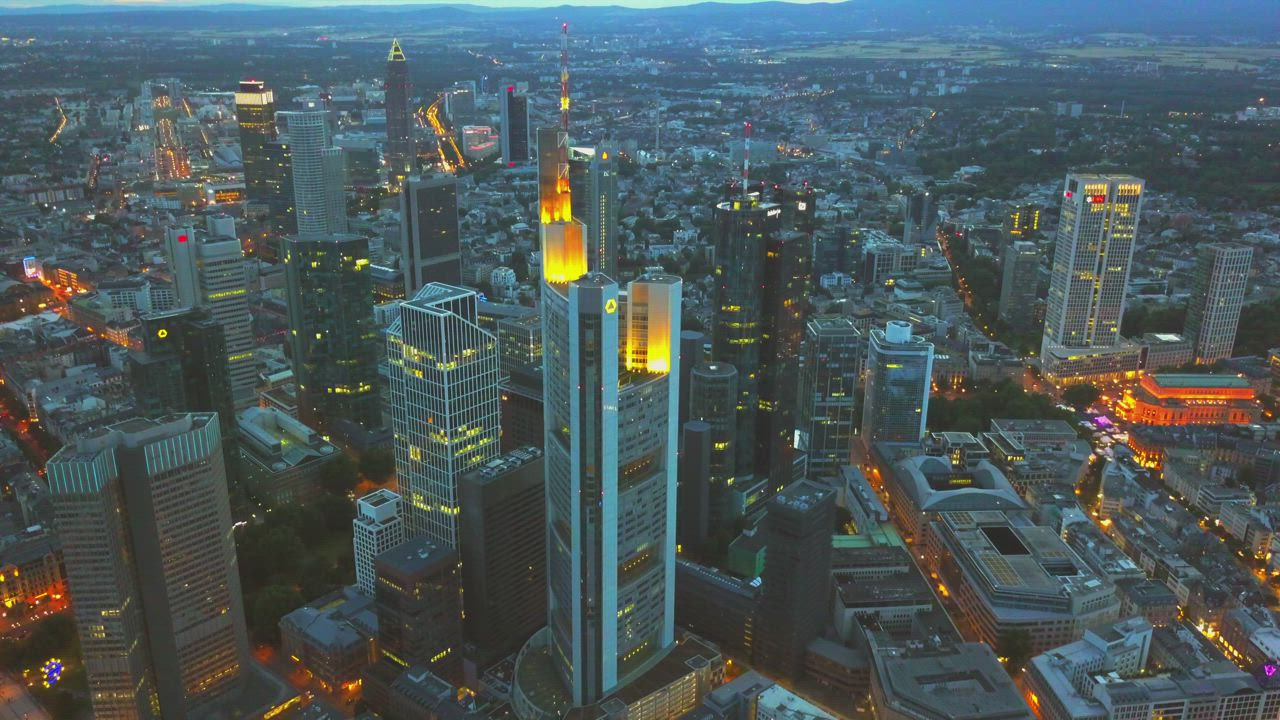 Aerial shot at dusk of the city of Frankfurt - Free Stock Video