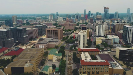 Aerial shot of a big city with tall buildings