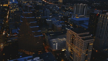 Aerial shot of a city at night.