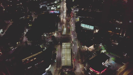 Aerial shot of a large avenue at night.