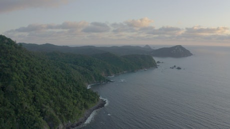Aerial shot of a peninsula and the sea.