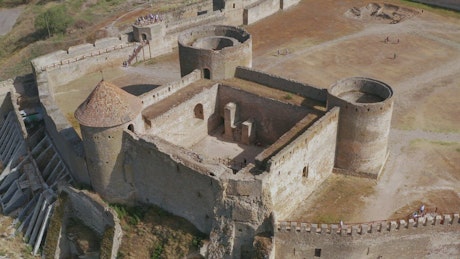 Aerial tour above an ancient castle.