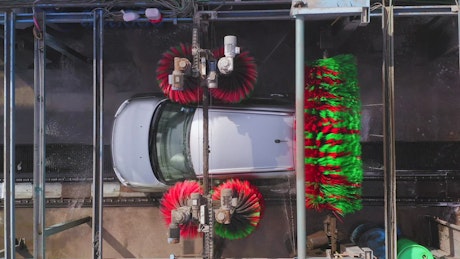 Aerial view of a car being washed.