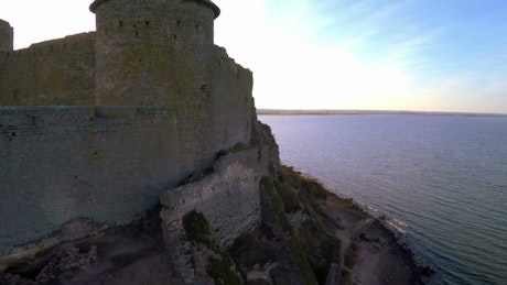 Aerial view of a fortress by the sea.