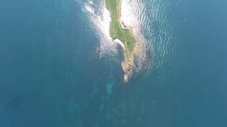 Aerial view of a peninsula and a blue ocean