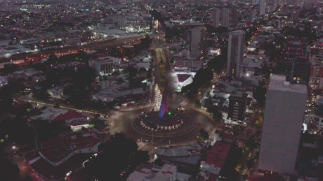 Aerial view of a roundabout in Guadalajara at night.