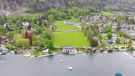 Aerial view of a village by the lake.