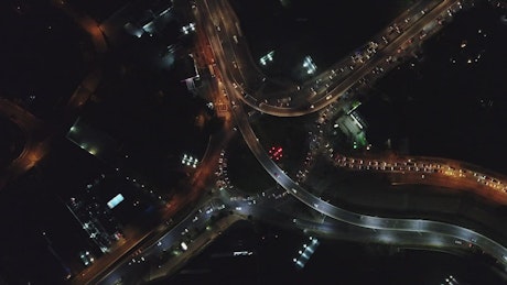 Aerial view of city traffic at night.