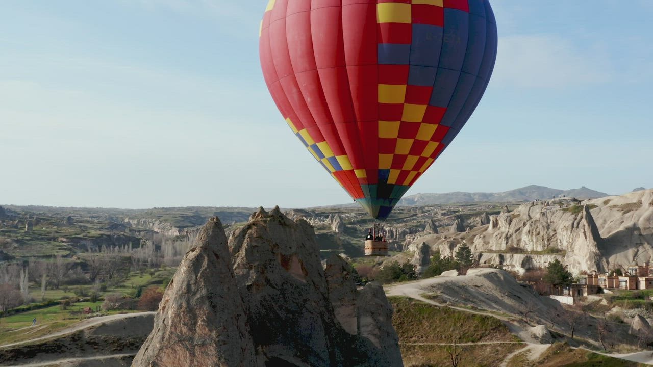 Aerial view of hot air balloon over Turkish landscape - Free Stock Video