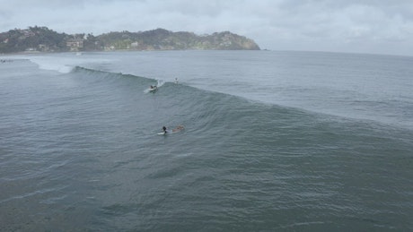 Aerial view of people surfing.