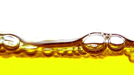 Air bubbles in oil in detail.