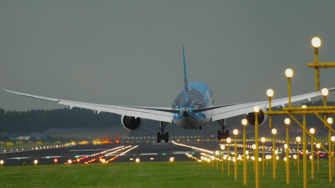 Airplane landing in illumi 888slot login nated airport tracks