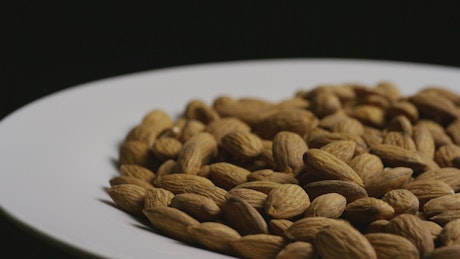 Almonds on a plate rotating