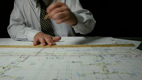 Architect drafting up plans