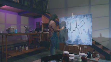 Artist working in his professional art studio