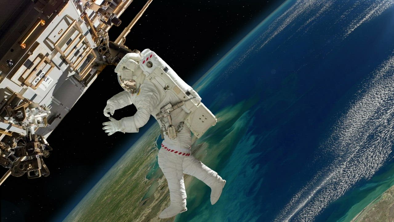 astronaut floating in spaceship