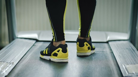Athlete running in the treadmill.