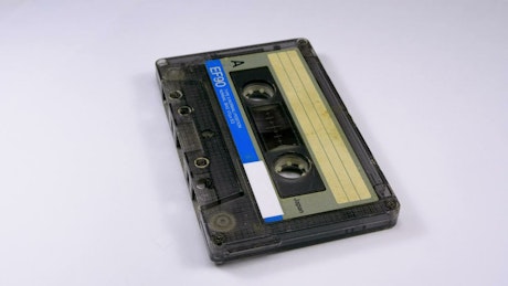 Audio cassette rotating.