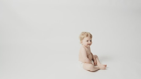 Baby girl in photo studio