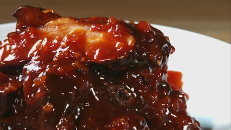 Barbecue sauce falling in slow motion.