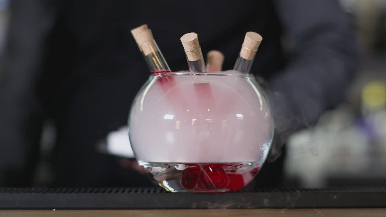 Bartender makes  spaceman demo rupiah an experimental cocktail