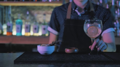 Bartender pouring a drink.