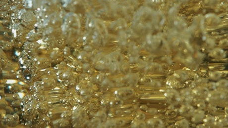 Beer bubbles in slow motion.
