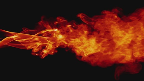 Billowing flame on a black background
