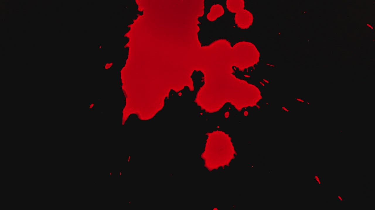 Blood drops on black background - Free Stock Video